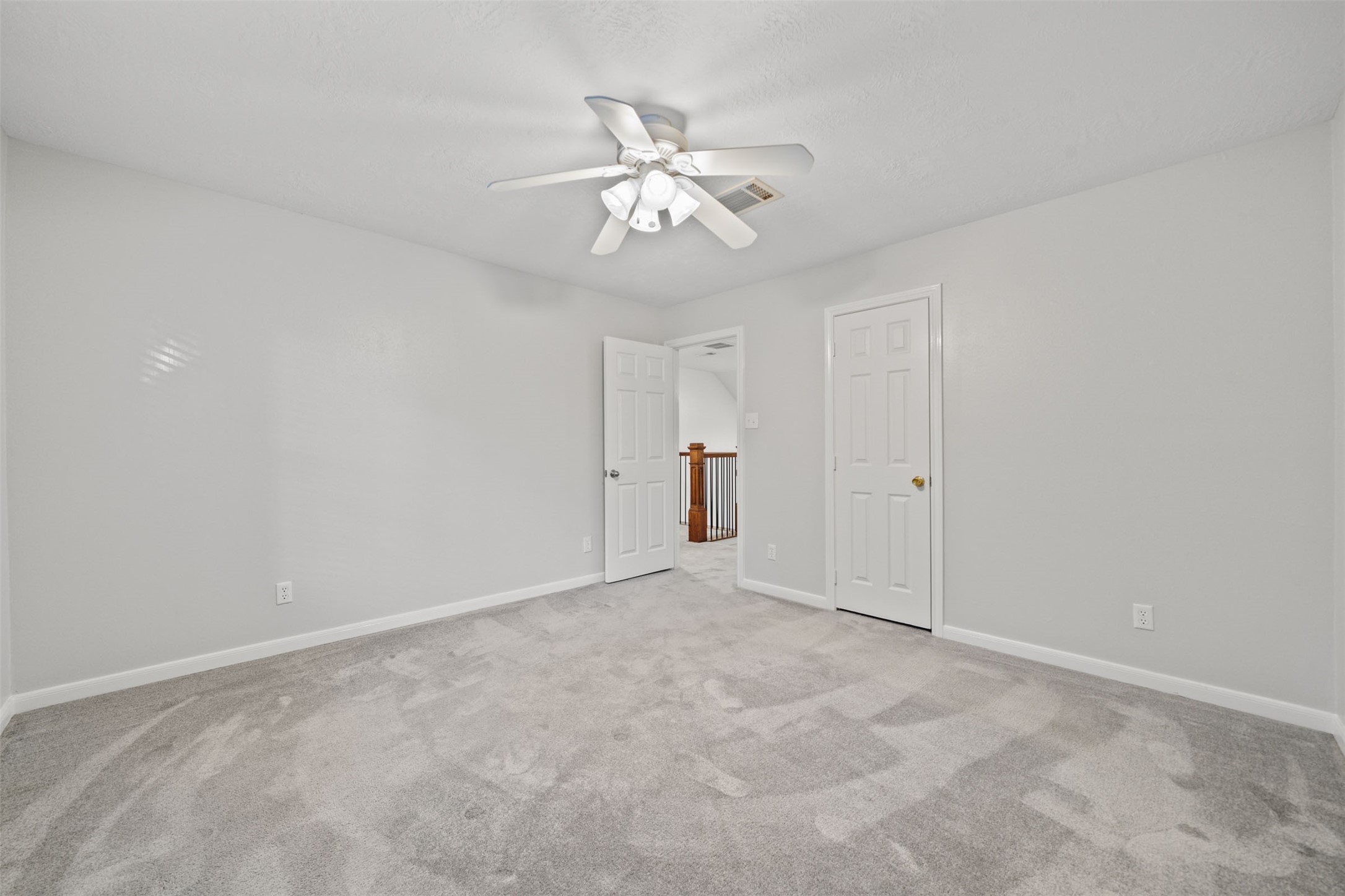 22323 Roberts Cemetery Road Hockley, TX 77447 - Photo 27 of 50 a view of an empty room with a ceiling fan
