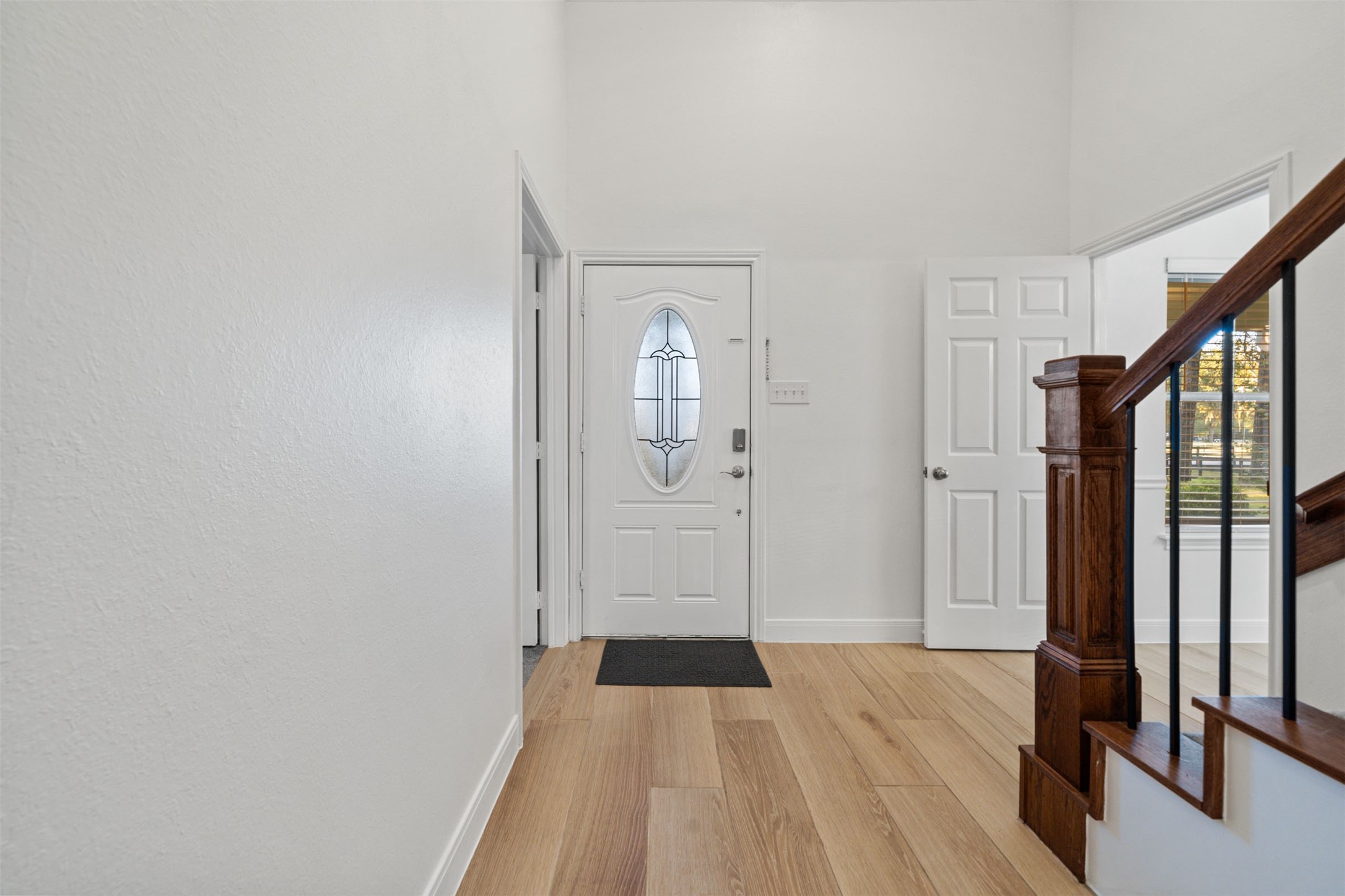 22323 Roberts Cemetery Road Hockley, TX 77447 - Photo 34 of 50 a view of a hallway with wooden floor and staircase
