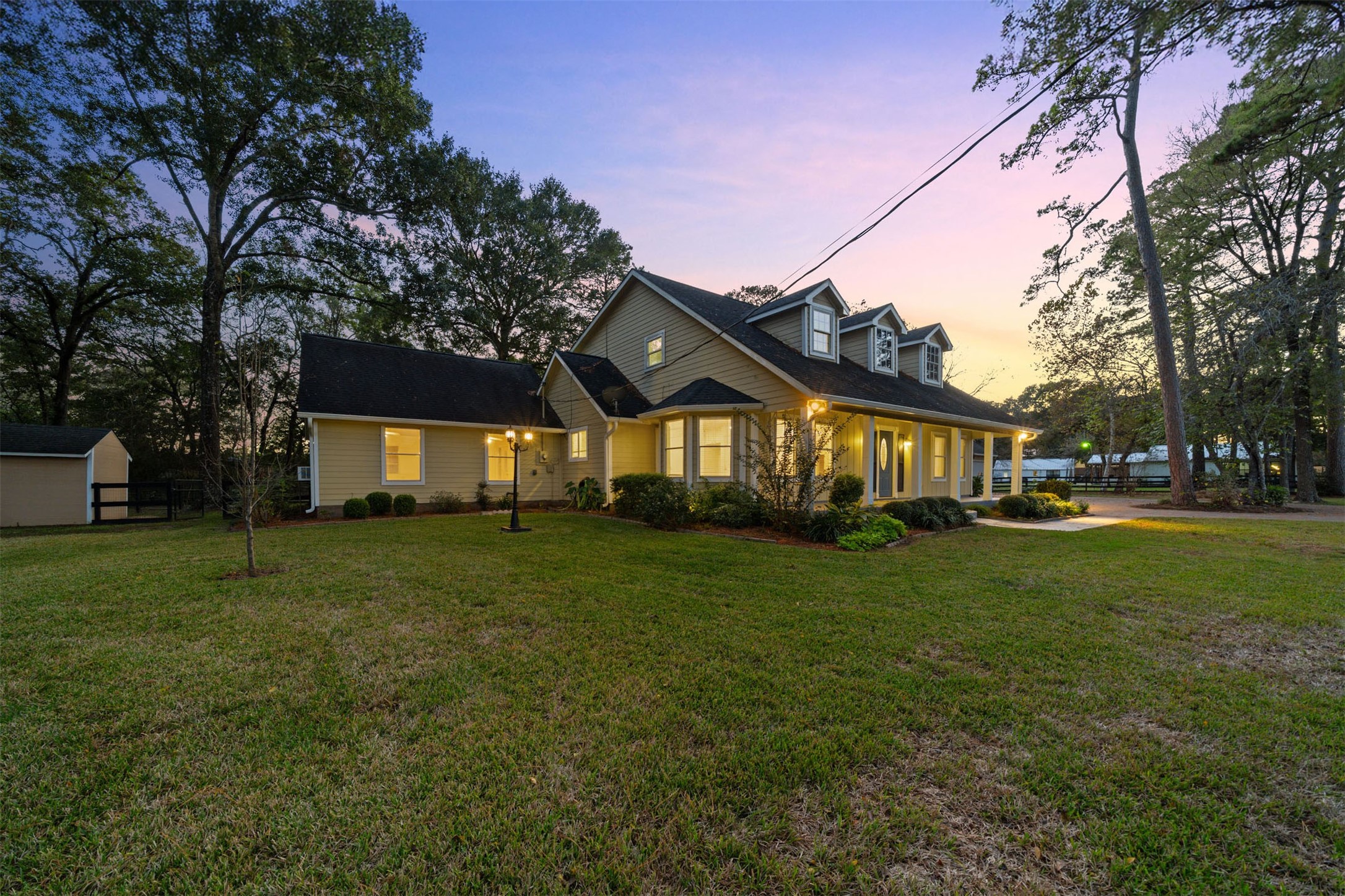 22323 Roberts Cemetery Road Hockley, TX 77447 - Photo 42 of 50 a view of a big house with a big yard and large trees