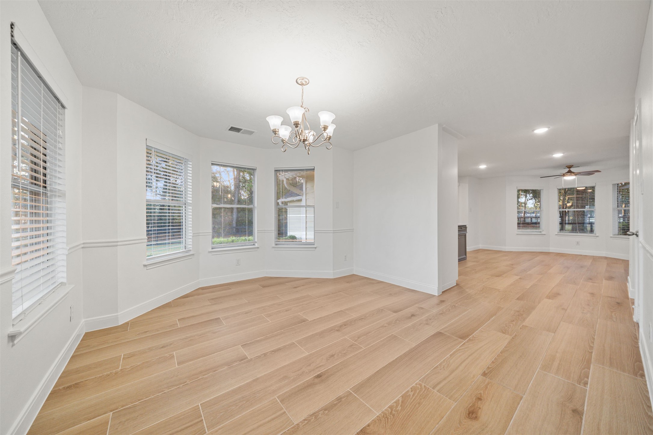 22323 Roberts Cemetery Road Hockley, TX 77447 - Photo 10 of 50 a big room with chandelier and windows