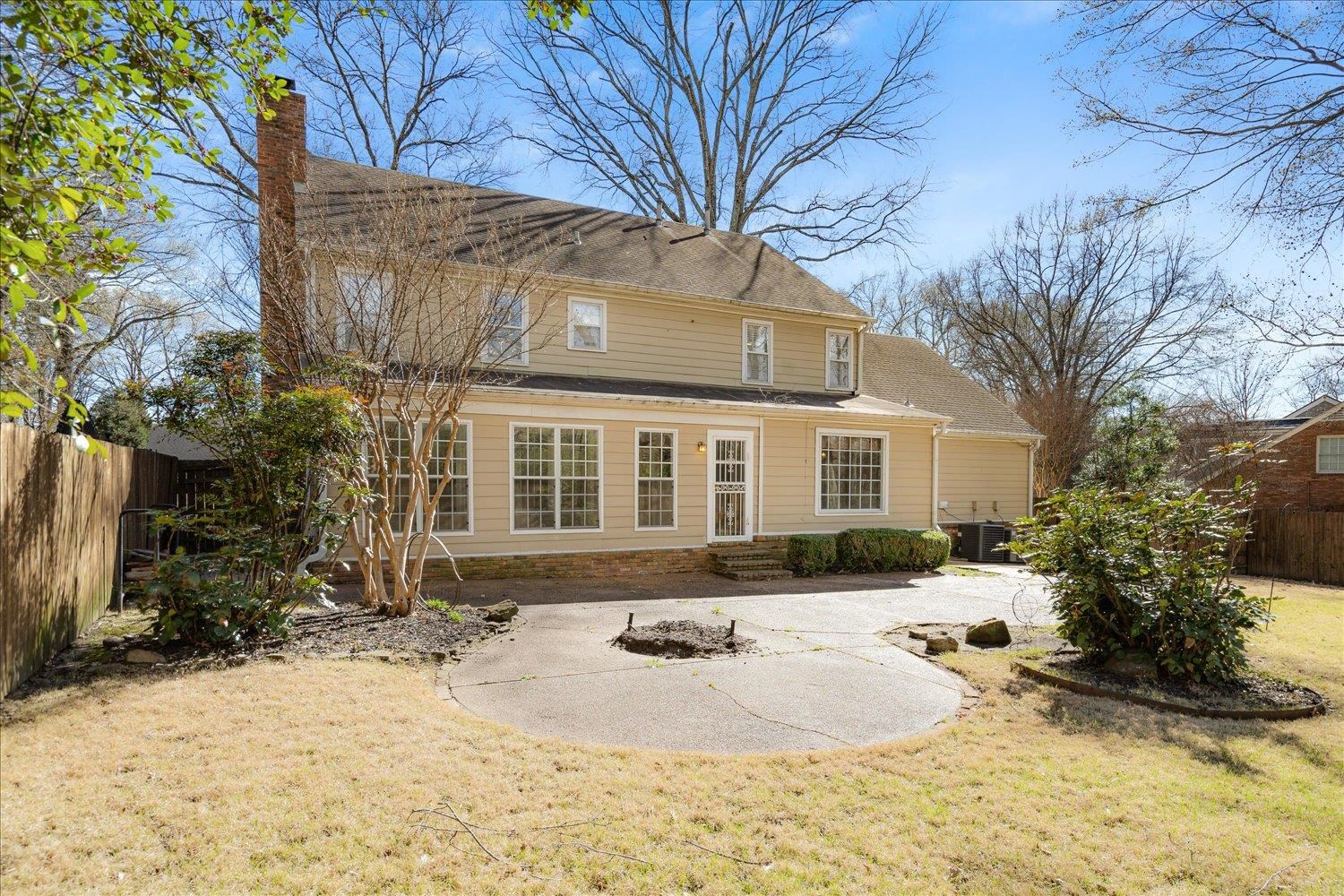 5680 Herald Square Memphis, TN 38120 - Photo 39 of 39 a front view of a house with a yard covered in snow