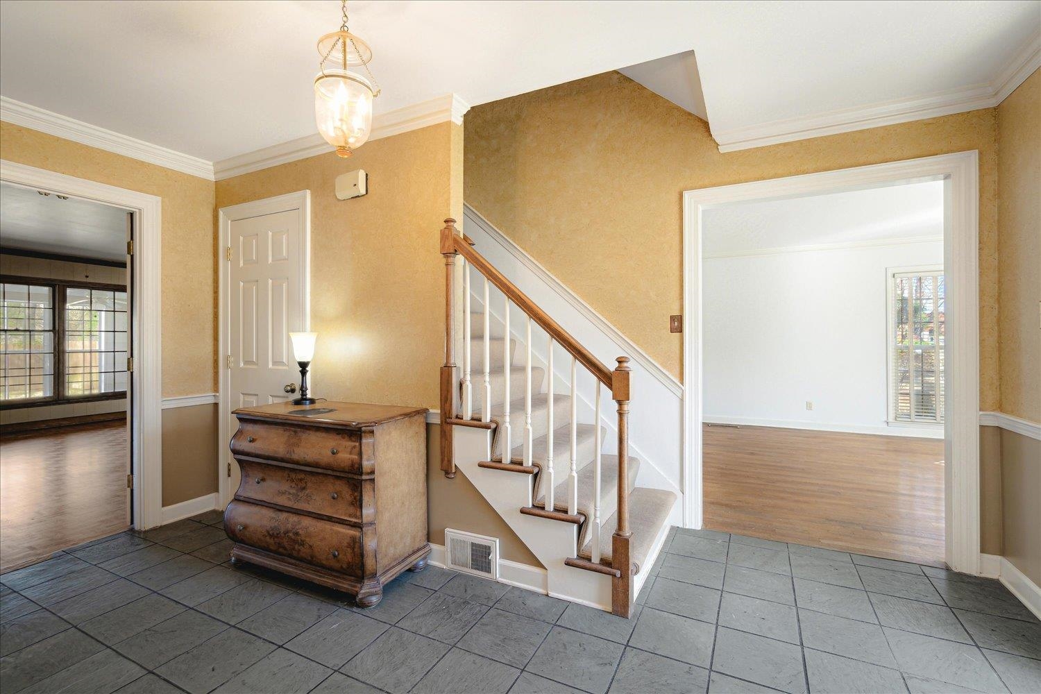 5680 Herald Square Memphis, TN 38120 - Photo 6 of 39 a view of a livingroom with furniture and staircase