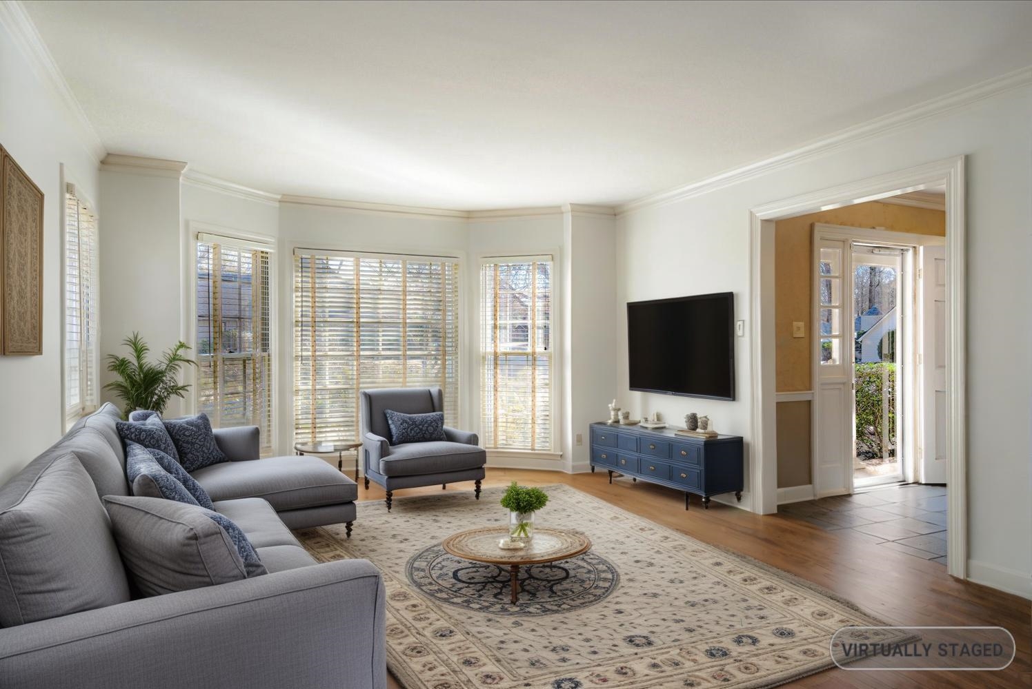 5680 Herald Square Memphis, TN 38120 - Photo 7 of 39 a living room with fireplace furniture and a flat screen tv