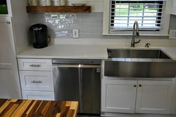 39 Nickerson Road Cotuit, MA 02635 - Photo 5 of 14 a kitchen with a sink and wooden floor