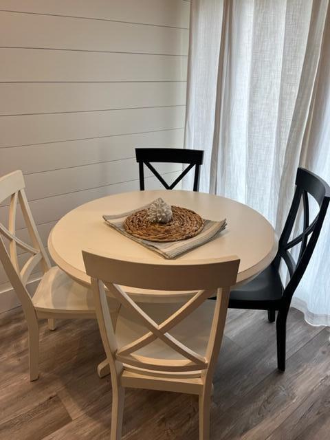 39 Nickerson Road Cotuit, MA 02635 - Photo 7 of 14 a view of a dining room with furniture and wooden floor