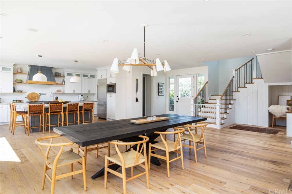 477 Magnolia Street Costa Mesa, CA 92627 - Photo 14 of 29 a view of a dining room with furniture and wooden floor