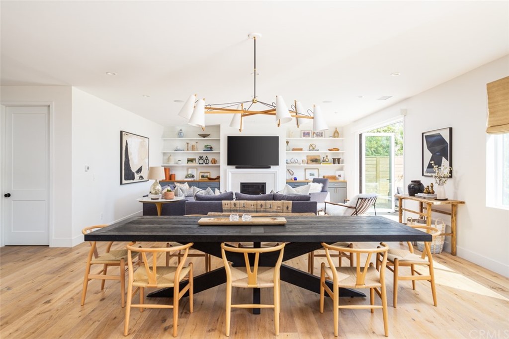 477 Magnolia Street Costa Mesa, CA 92627 - Photo 5 of 29 a view of a dining room with furniture and wooden floor