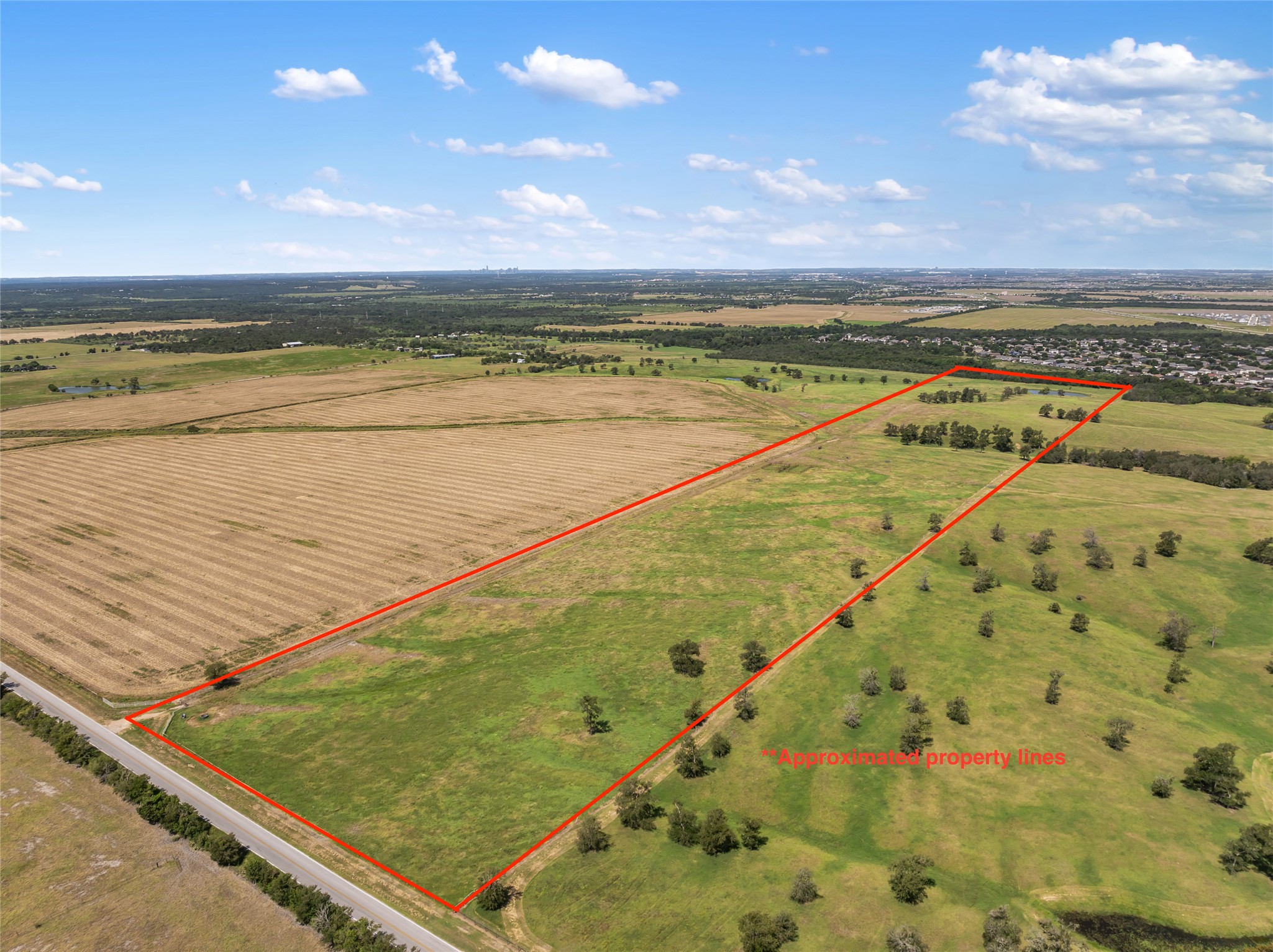 12500 County Line Road Elgin, TX 78621 - Photo 2 of 9 Aerial view of sparsely populated area with property parcel outlined