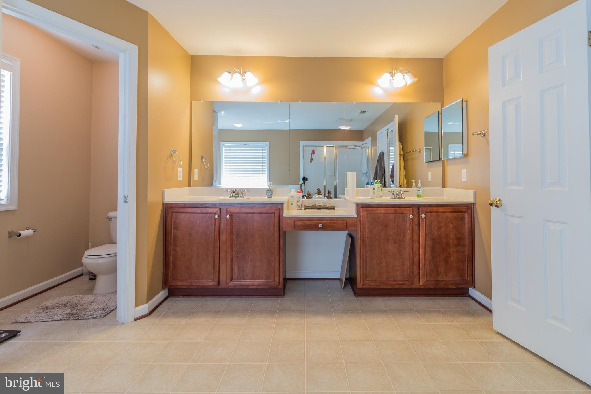 8 Banner Spring Circle Stafford, VA 22554 - Photo 14 of 34 Dual vanities and water closet in the master bath
