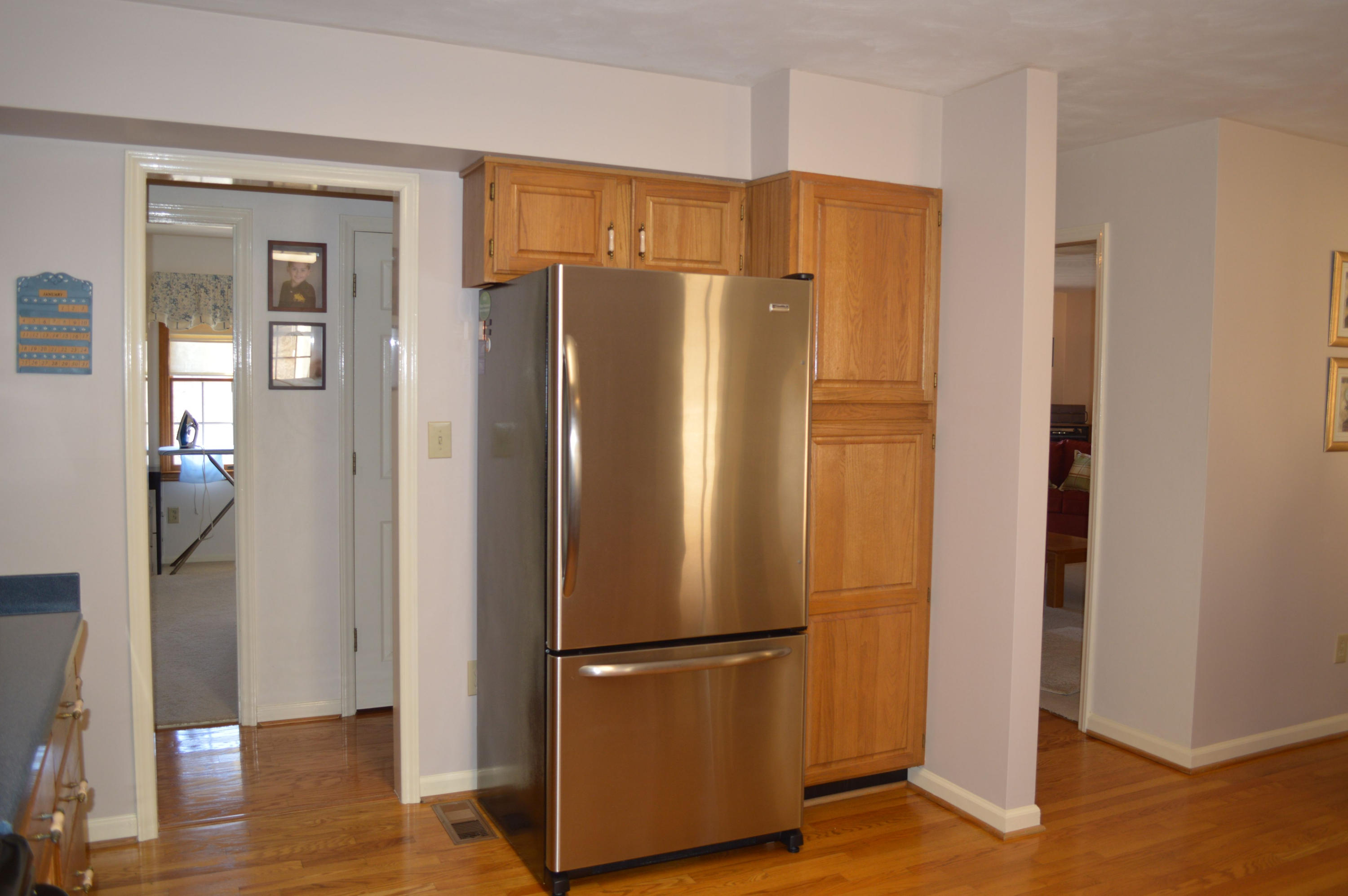 92 Oak Crest Drive Blue Ridge, VA 24064 - Photo 11 of 48 a white refrigerator freezer sitting in a kitchen
