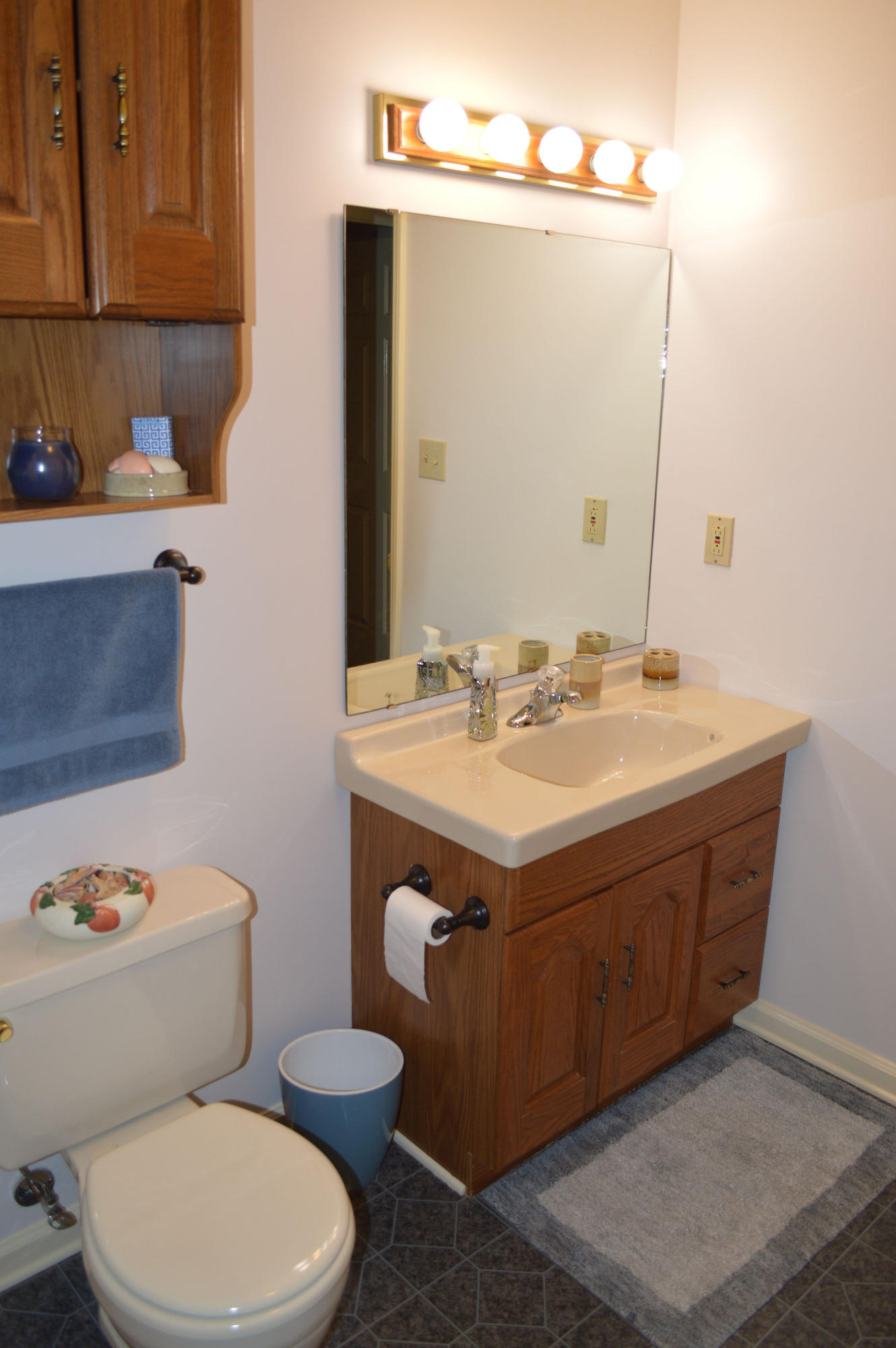 92 Oak Crest Drive Blue Ridge, VA 24064 - Photo 17 of 48 a bathroom with a sink a toilet and mirror