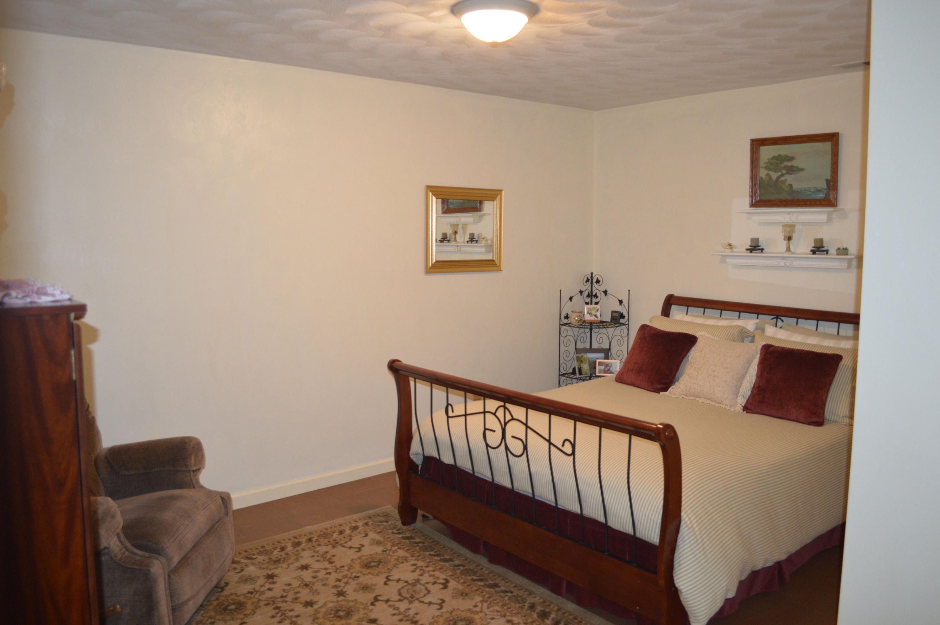 92 Oak Crest Drive Blue Ridge, VA 24064 - Photo 18 of 48 a bedroom with furniture and a baby crib
