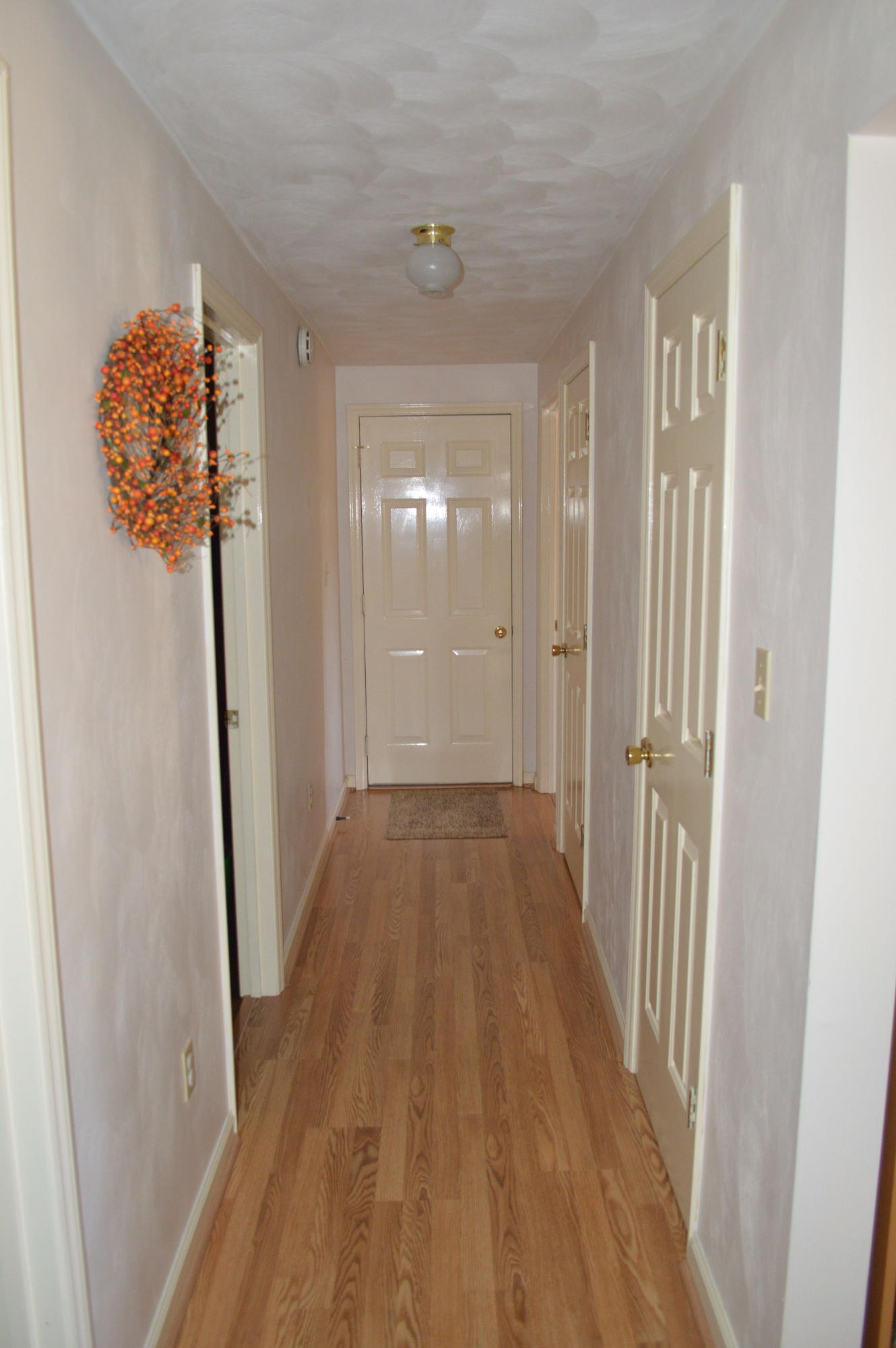 92 Oak Crest Drive Blue Ridge, VA 24064 - Photo 20 of 48 a view of a hallway with wooden floor