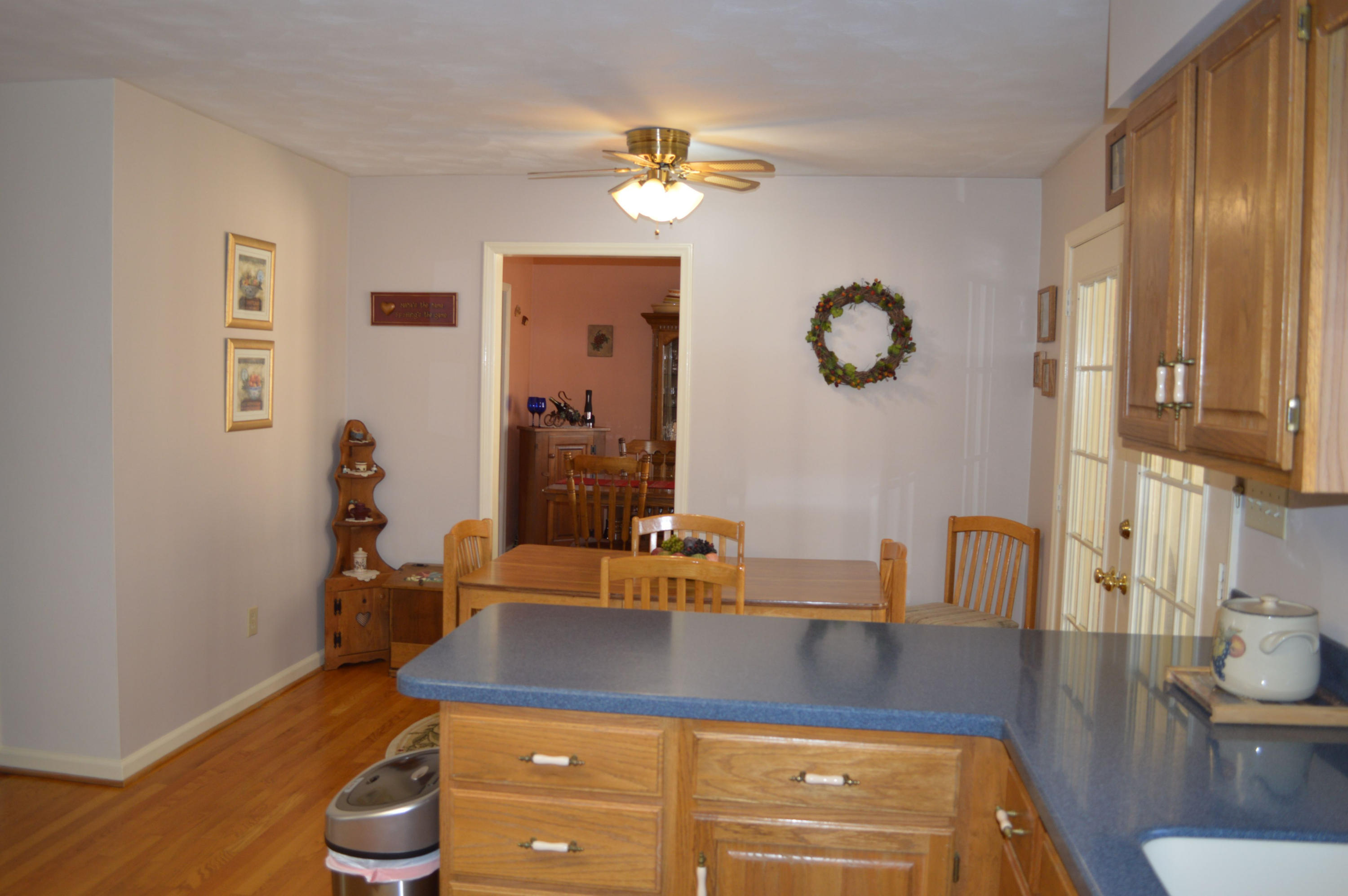 92 Oak Crest Drive Blue Ridge, VA 24064 - Photo 31 of 48 a dining room with table chairs and wooden floor