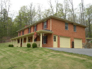 92 Oak Crest Drive Blue Ridge, VA 24064 - Photo 47 of 48 a view of a house with a yard