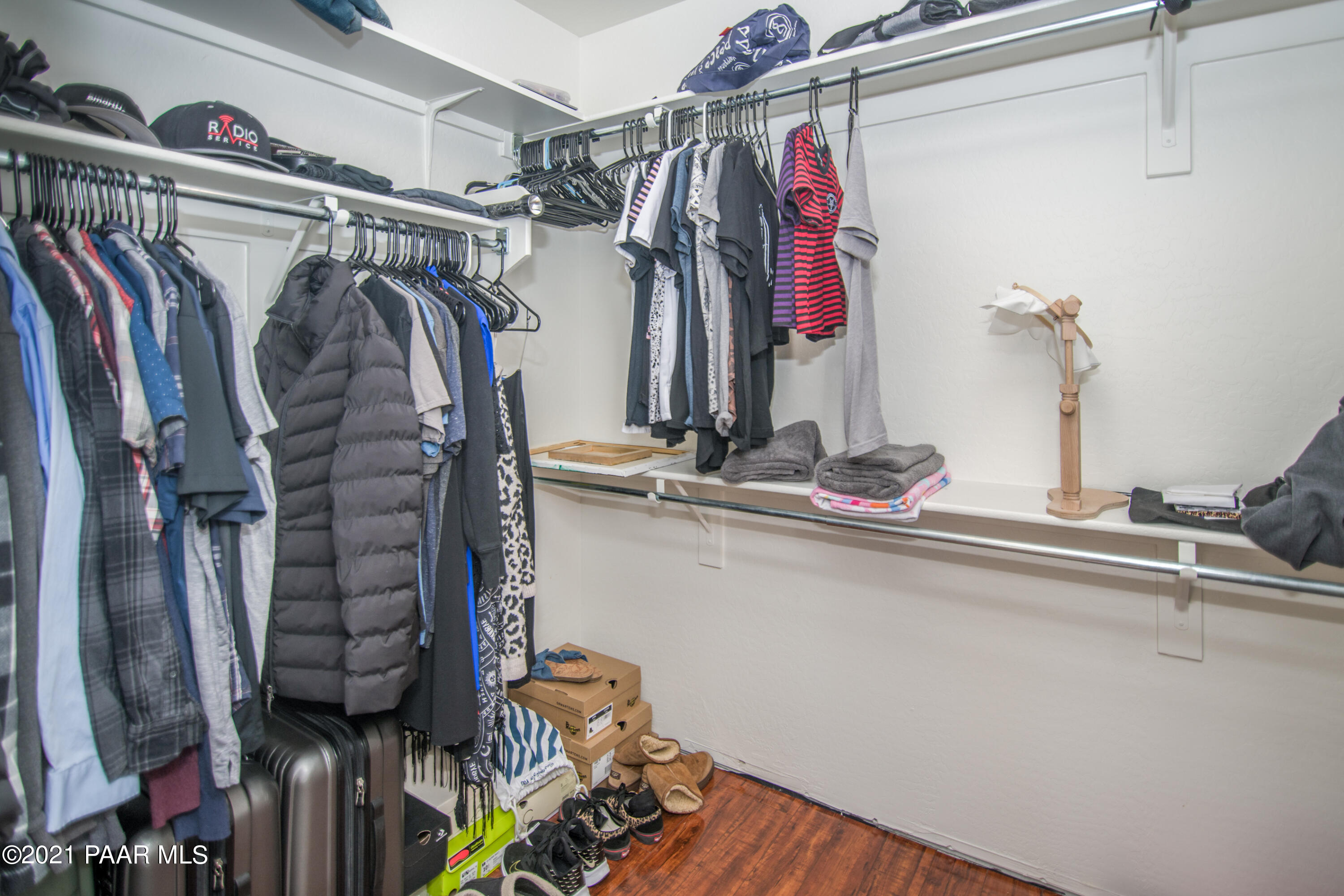 7402 East Plateau Ridge Road Prescott Valley, AZ 86315 - Photo 22 of 31 a view of walk in closet with clothes