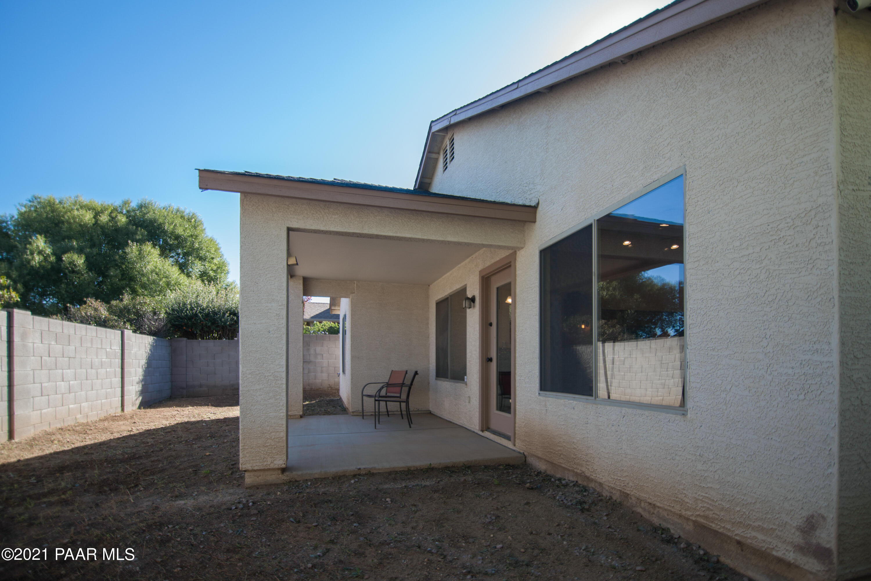 7402 East Plateau Ridge Road Prescott Valley, AZ 86315 - Photo 31 of 31 a view of a house with a backyard