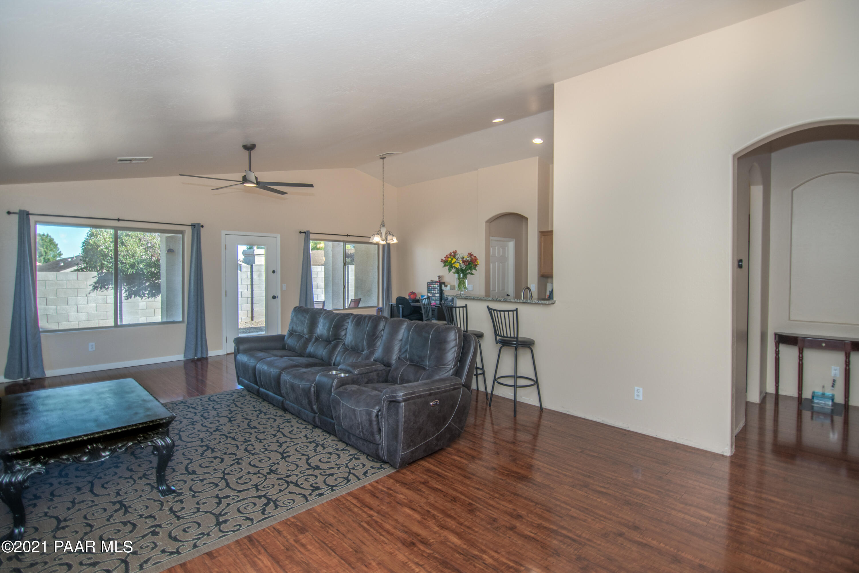 7402 East Plateau Ridge Road Prescott Valley, AZ 86315 - Photo 6 of 31 a living room with furniture and a large window