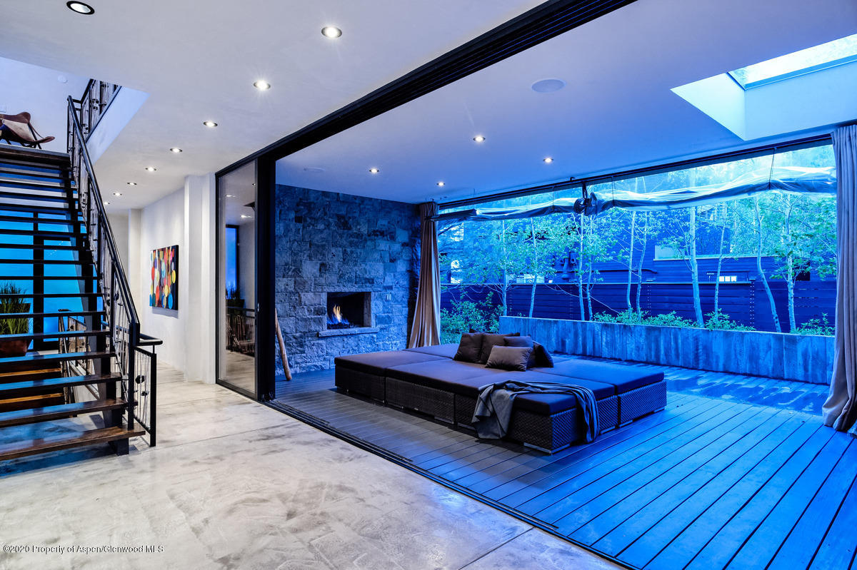 263 Park Avenue Aspen, CO 81611 - Photo 11 of 32 a living room with furniture and wooden floor