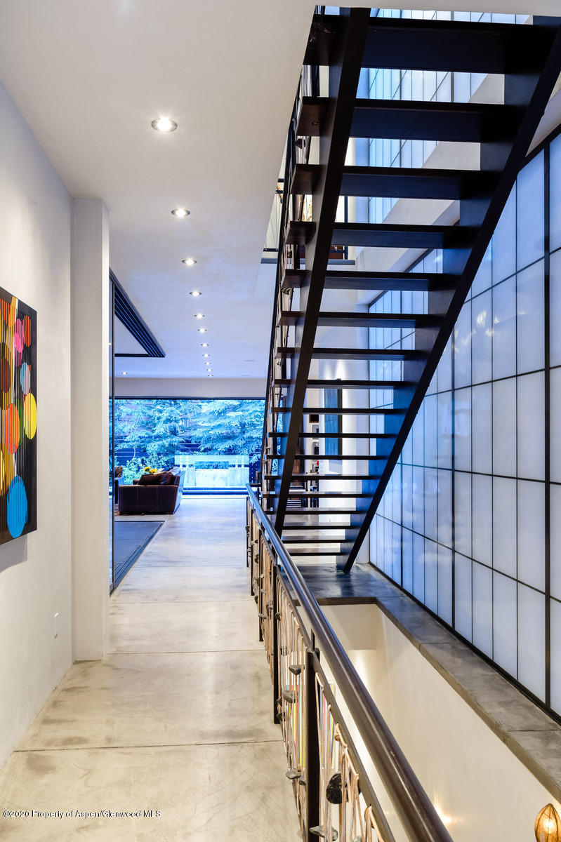 263 Park Avenue Aspen, CO 81611 - Photo 21 of 32 a view of entryway and hall with wooden floor
