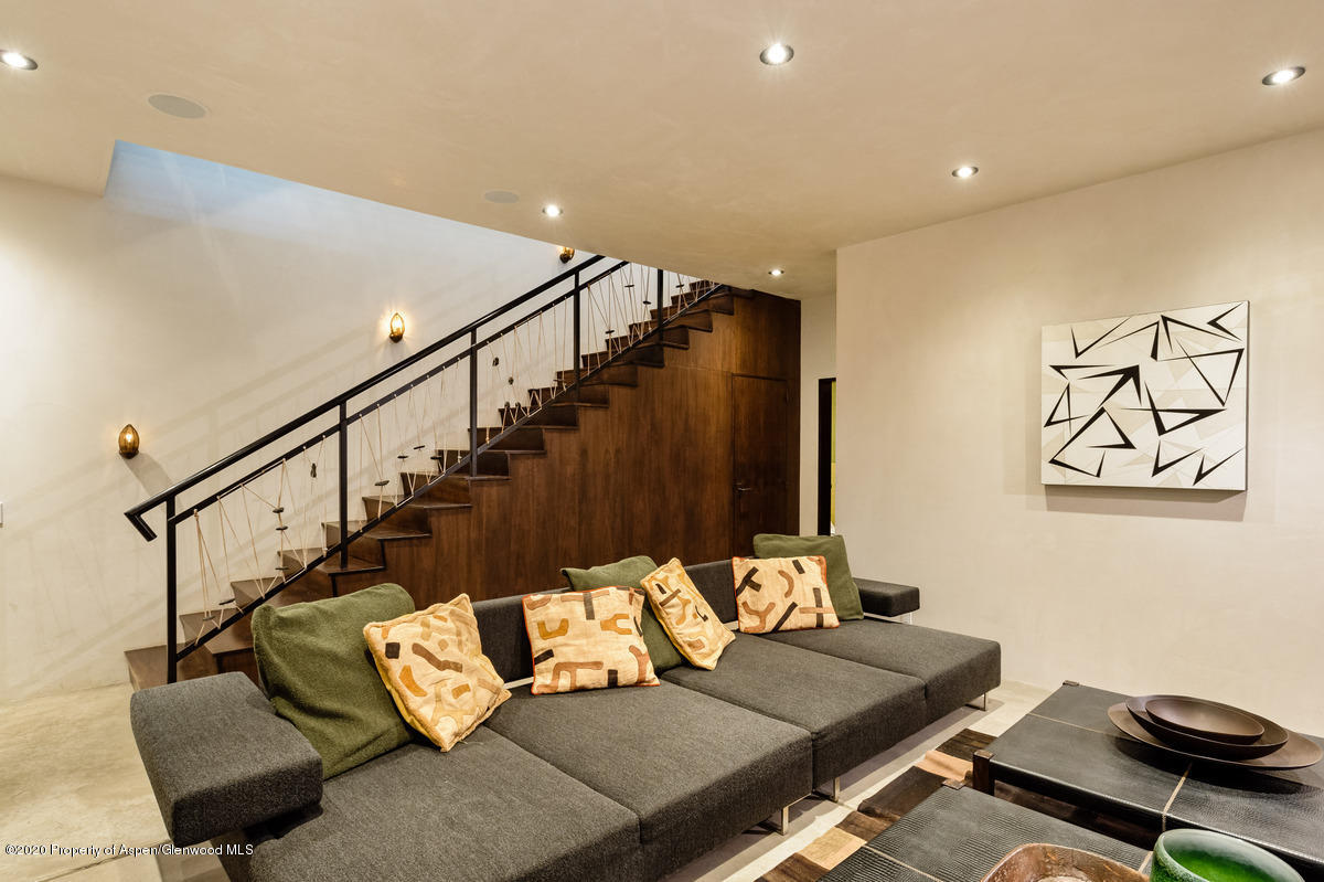 263 Park Avenue Aspen, CO 81611 - Photo 22 of 32 a living room with furniture and wooden floor