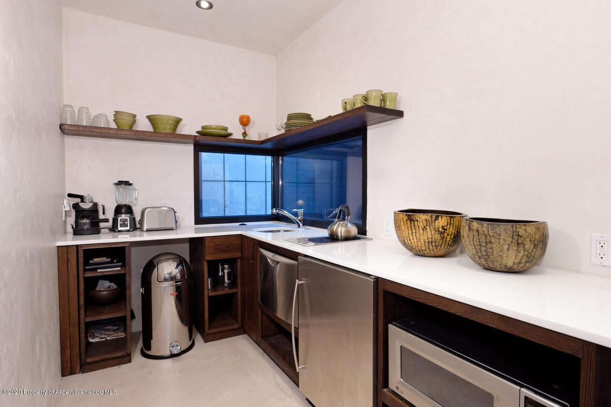 263 Park Avenue Aspen, CO 81611 - Photo 26 of 32 a view of cabinets and window