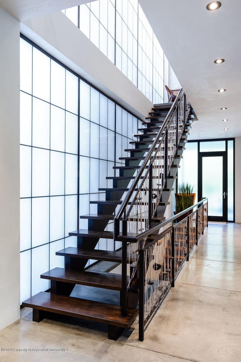 263 Park Avenue Aspen, CO 81611 - Photo 29 of 32 a view of entryway and hall with wooden floor