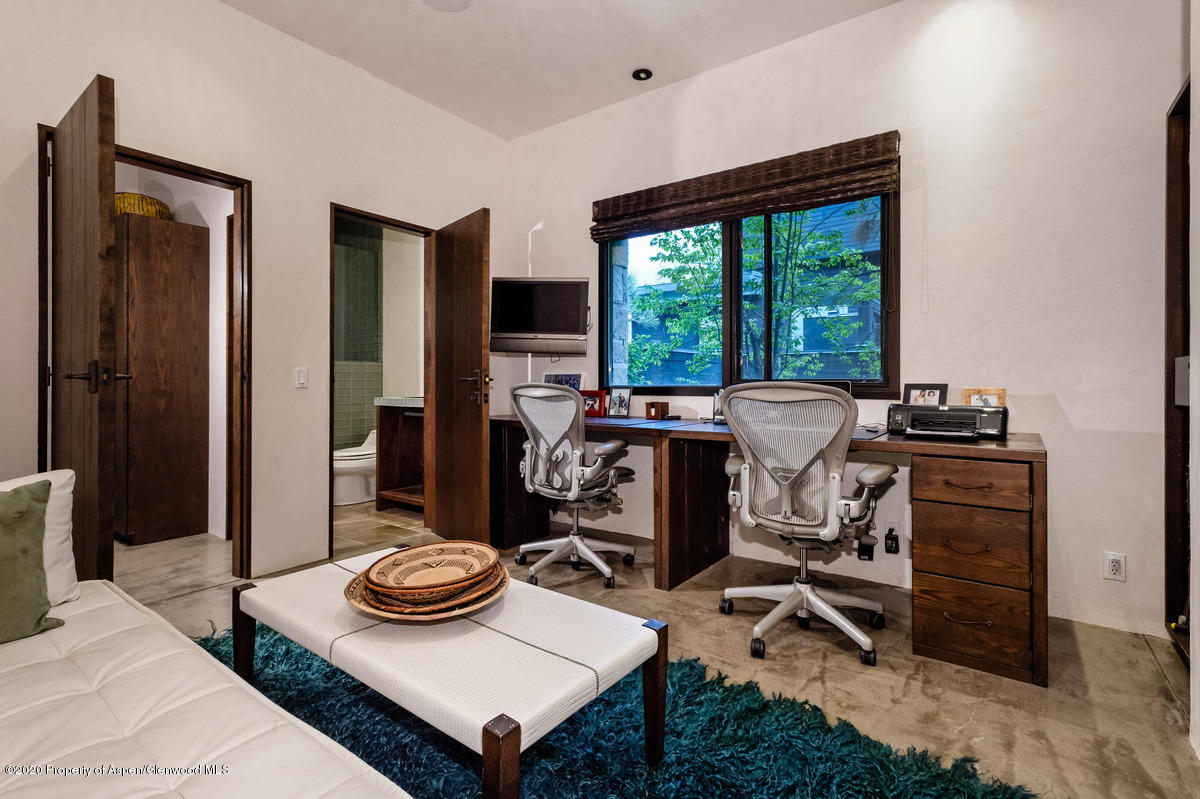 263 Park Avenue Aspen, CO 81611 - Photo 30 of 32 a view of a workspace with furniture