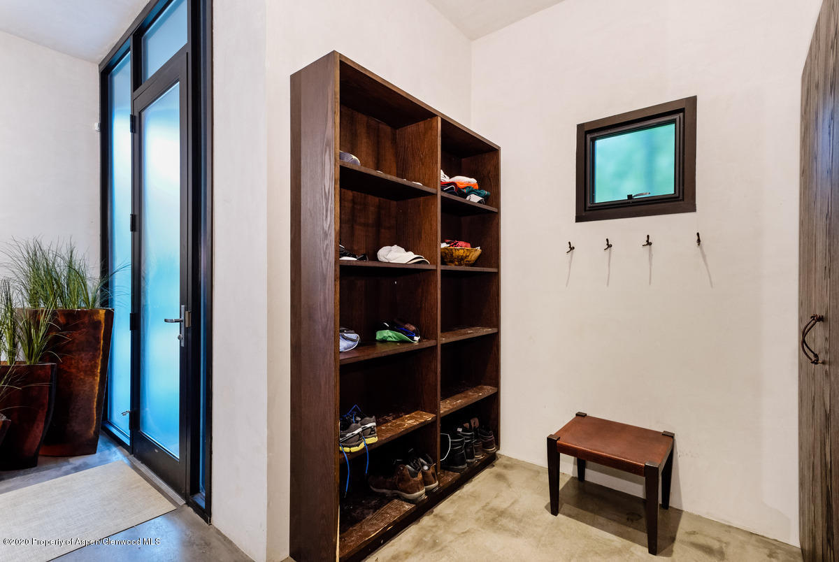 263 Park Avenue Aspen, CO 81611 - Photo 31 of 32 a view of room with shelves and closet