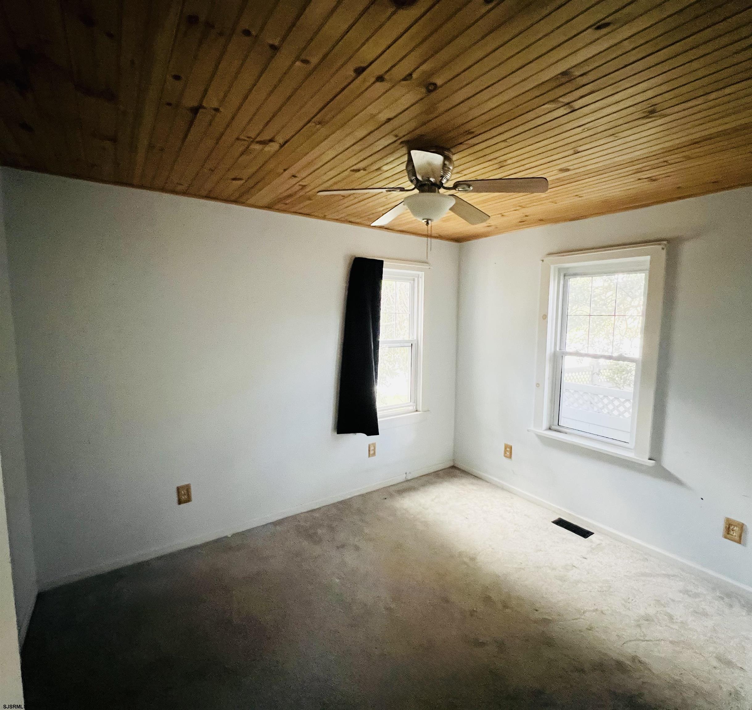 194 North Shore Road Absecon, NJ 08201 - Photo 11 of 14 a view of an empty room with a window