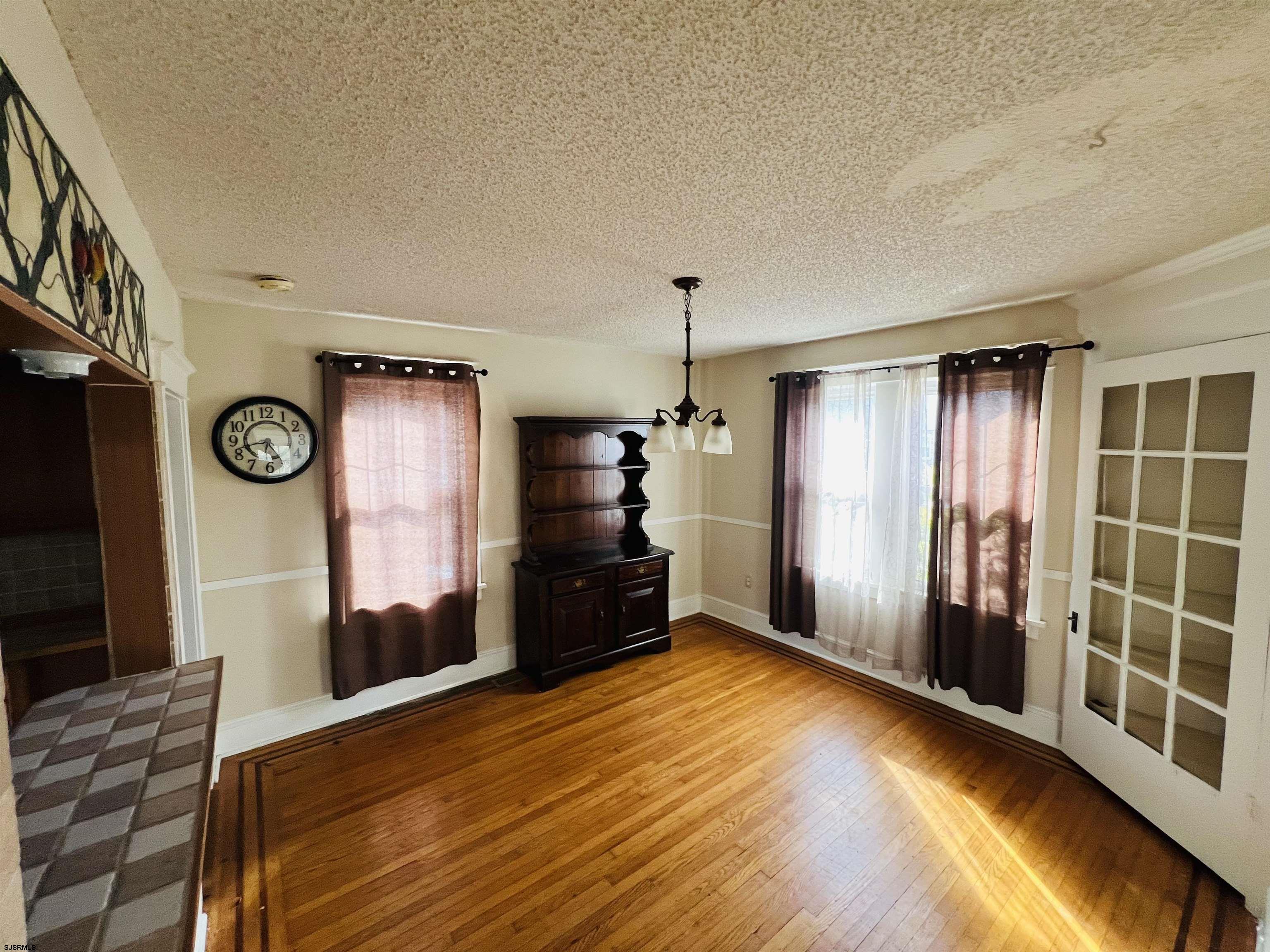 194 North Shore Road Absecon, NJ 08201 - Photo 8 of 14 a view of a kitchen with refrigerator and windows