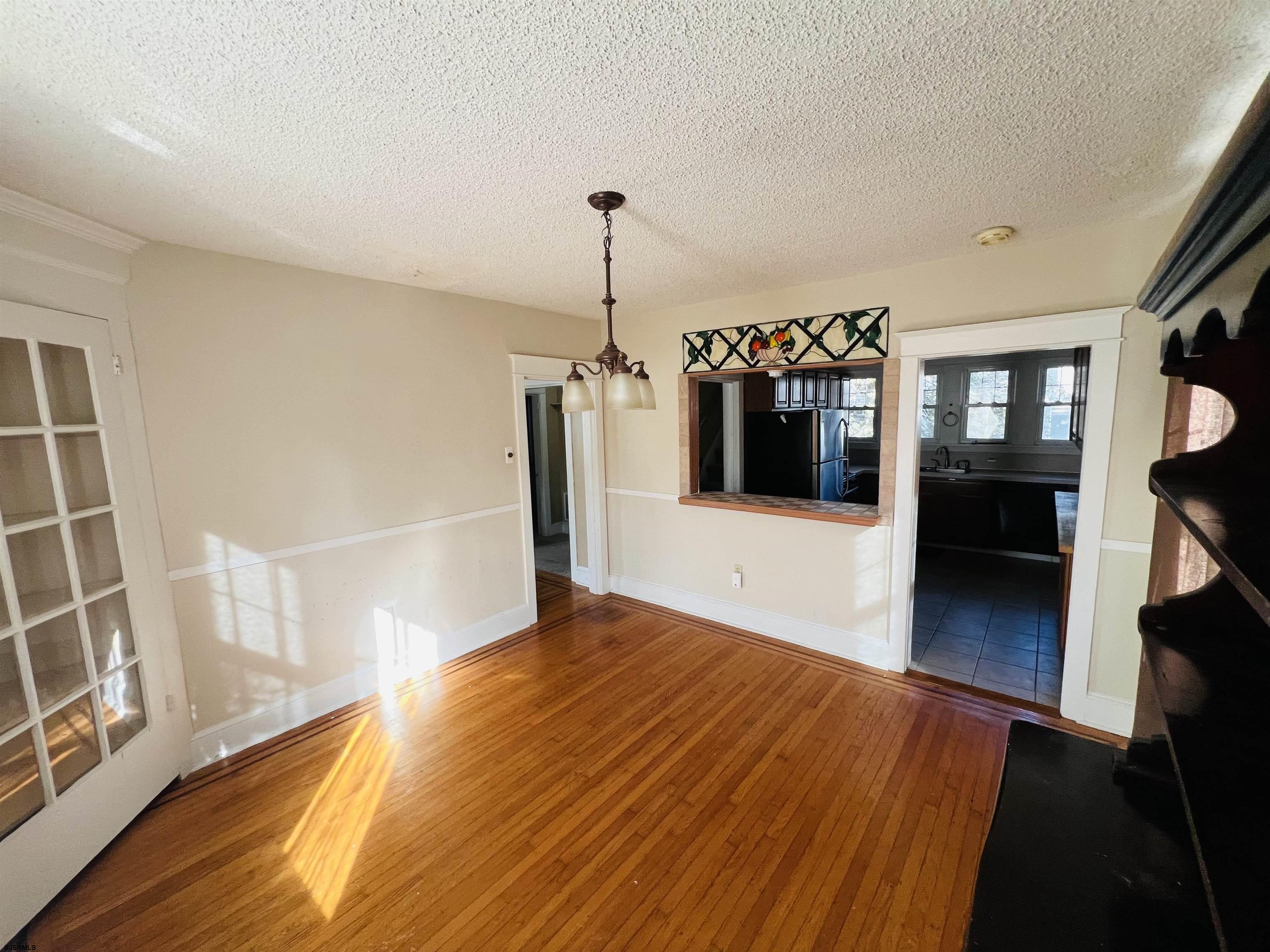 194 North Shore Road Absecon, NJ 08201 - Photo 10 of 14 a view of a living room with a flat screen tv