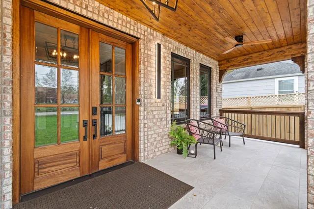 a living room with furniture and windows