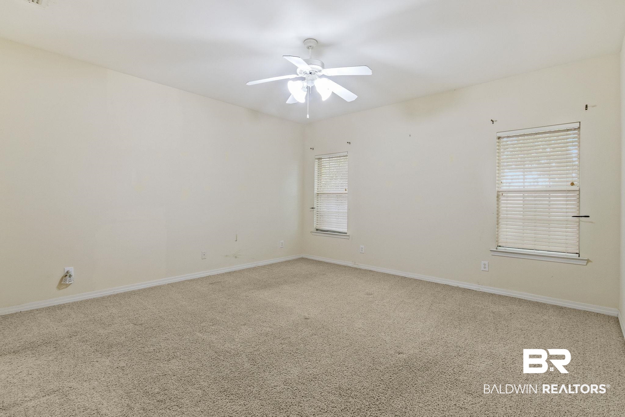 166 Club Drive Fairhope, AL 36532 - Photo 20 of 41 Carpeted empty room featuring ceiling fan