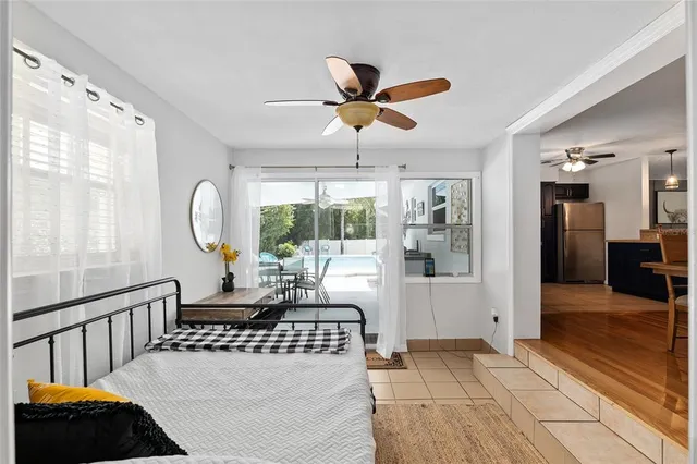 a view of a swimming pool with a patio