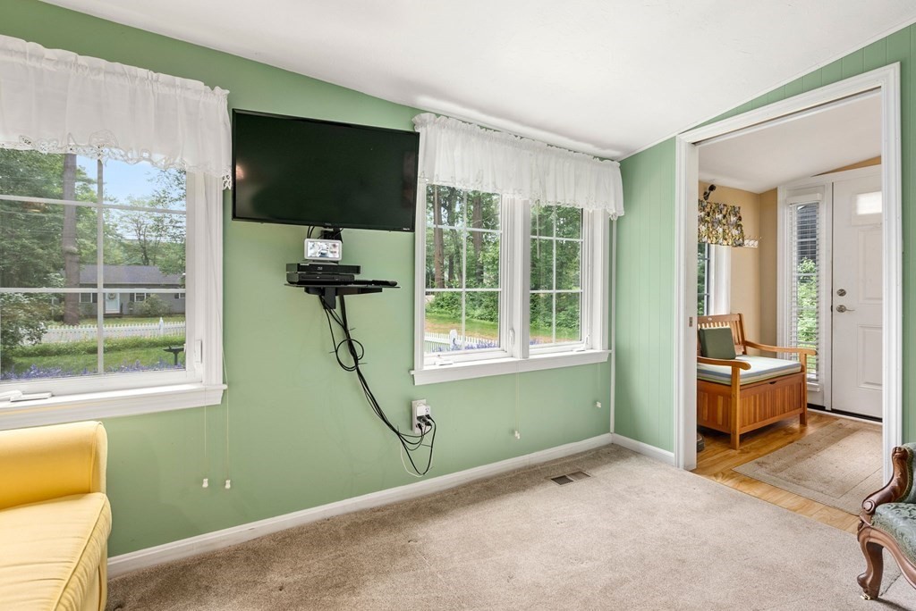 6 Craig Road Holland, MA 01521 - Photo 14 of 28 a view of a livingroom with furniture and windows