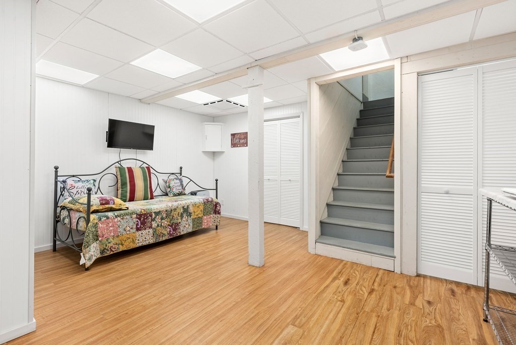 6 Craig Road Holland, MA 01521 - Photo 15 of 28 a bedroom with furniture and wooden floor