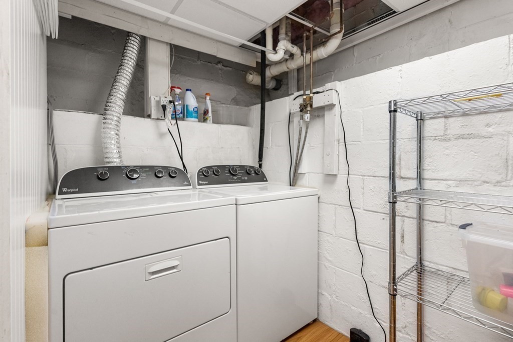 6 Craig Road Holland, MA 01521 - Photo 17 of 28 a view of storage and utility room with washer and dryer