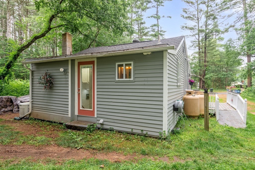 6 Craig Road Holland, MA 01521 - Photo 19 of 28 a view of a house with a yard