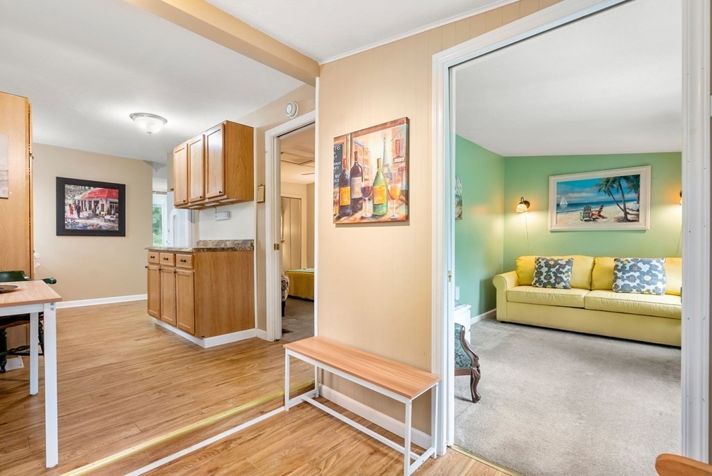 6 Craig Road Holland, MA 01521 - Photo 5 of 28 a living room with furniture and a wooden floor