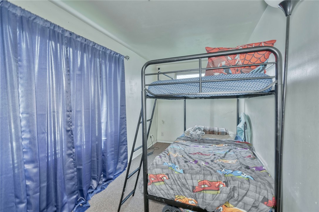 1796 Long Pond Road Gates, NY 14606 - Photo 22 of 25 Lower Unit Bedroom 2