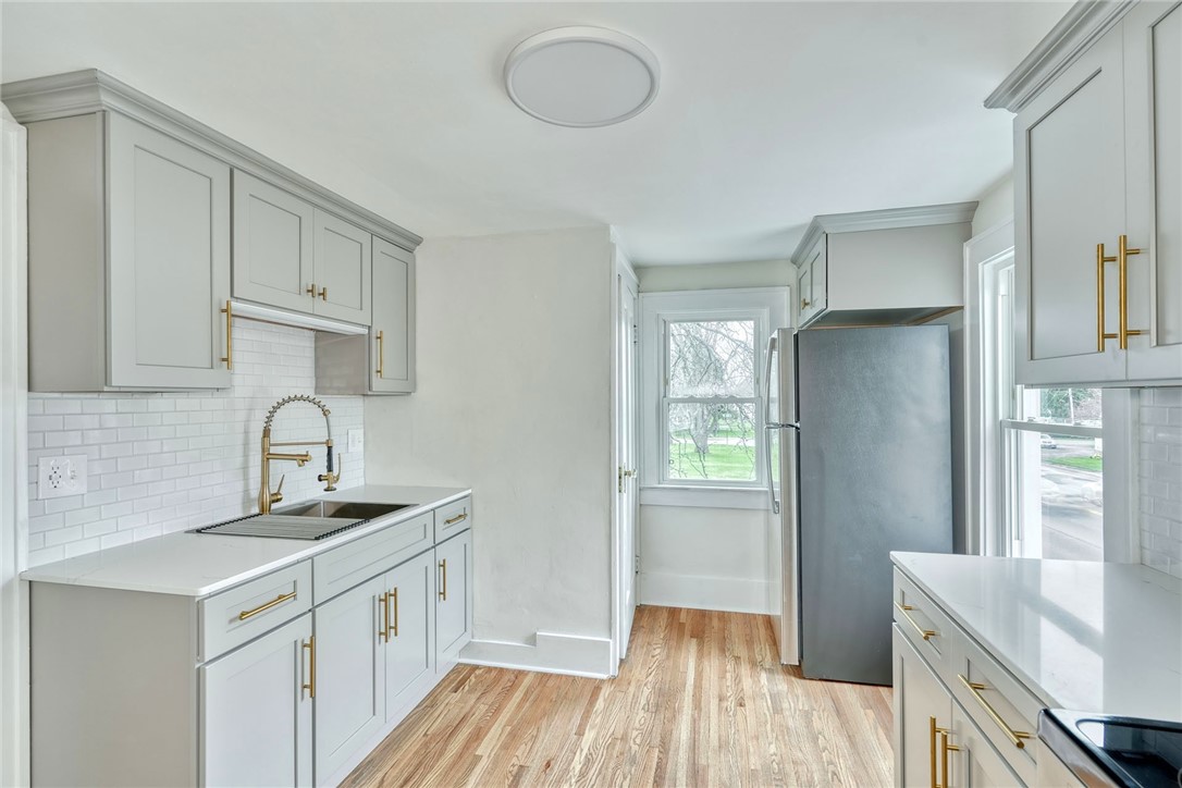 1796 Long Pond Road Gates, NY 14606 - Photo 3 of 25 Upper Unit Kitchen