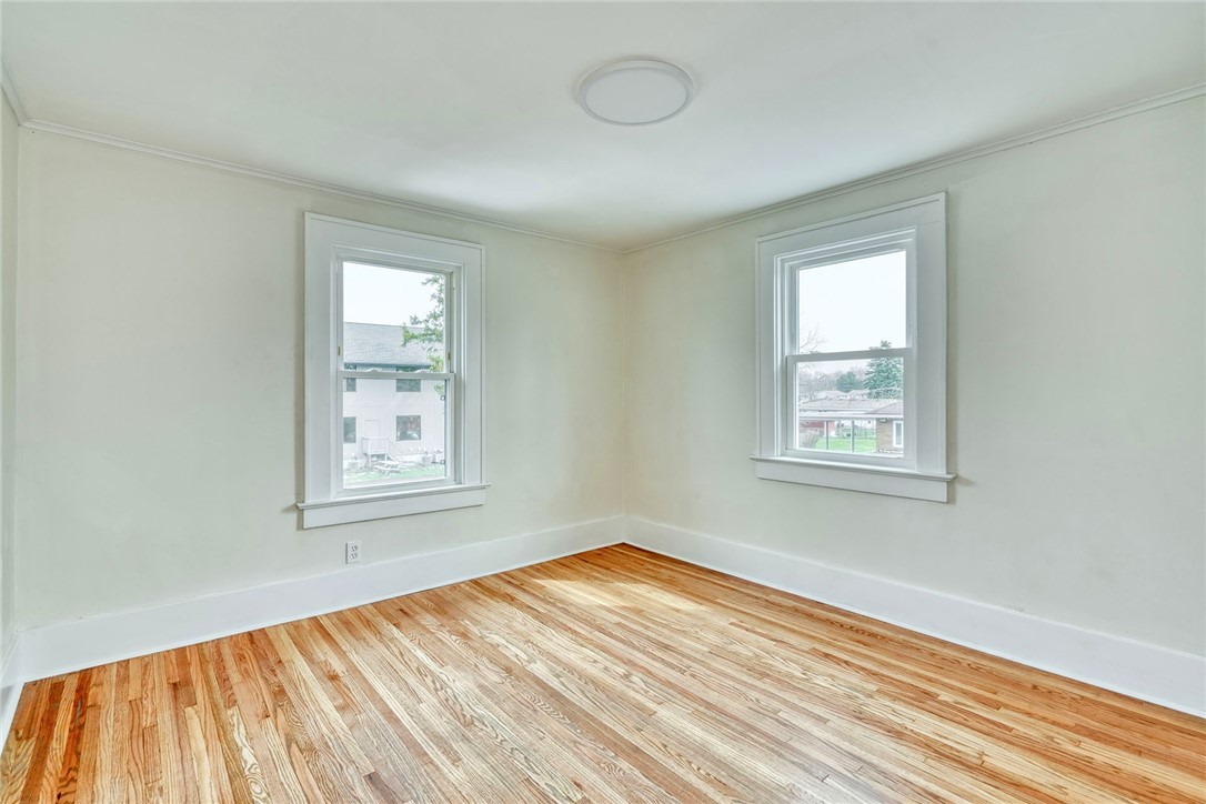 1796 Long Pond Road Gates, NY 14606 - Photo 9 of 25 Upper Unit Bedroom/living room