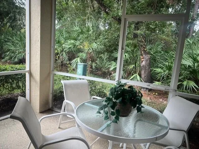 a view of a patio in the backyard