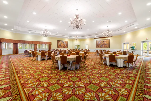 a view of a swimming pool with an outdoor space and seating area