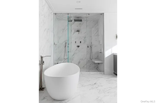 a bathroom with a shower and a toilet