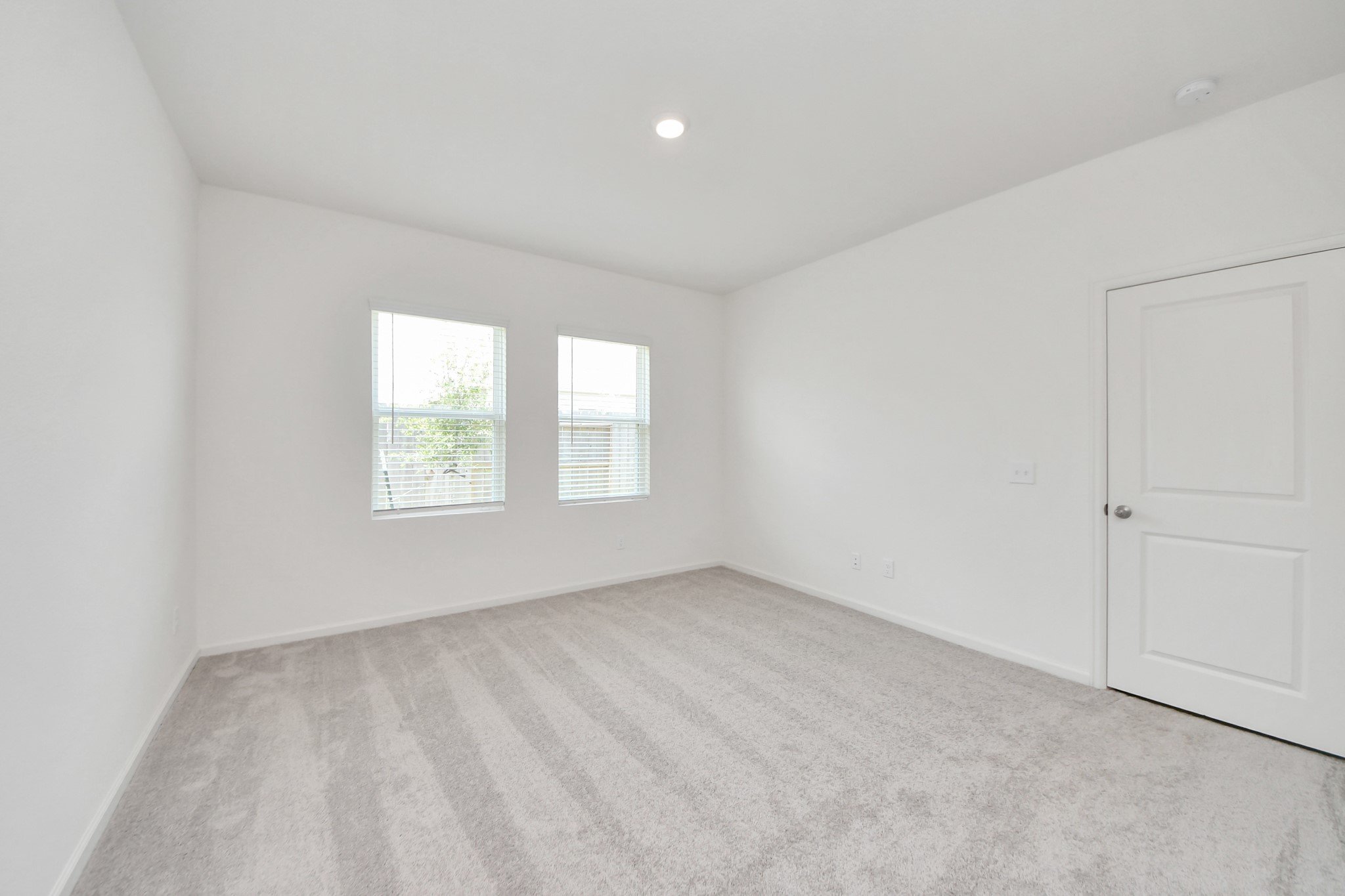 10309 Malta Trce Drive Rosharon, TX 77583 - Photo 28 of 49 an empty room with windows