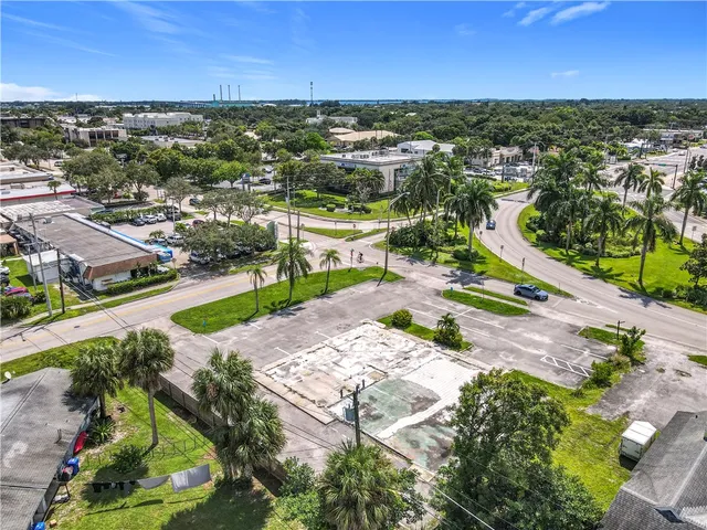 an aerial view of a house with outdoor space