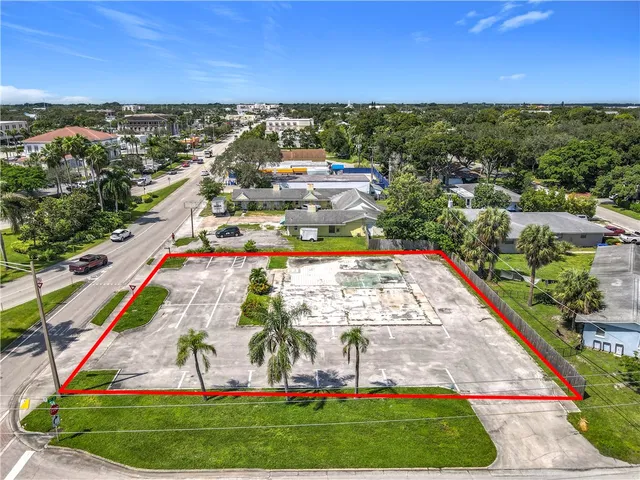 a view of swimming pool with outdoor seating and yard