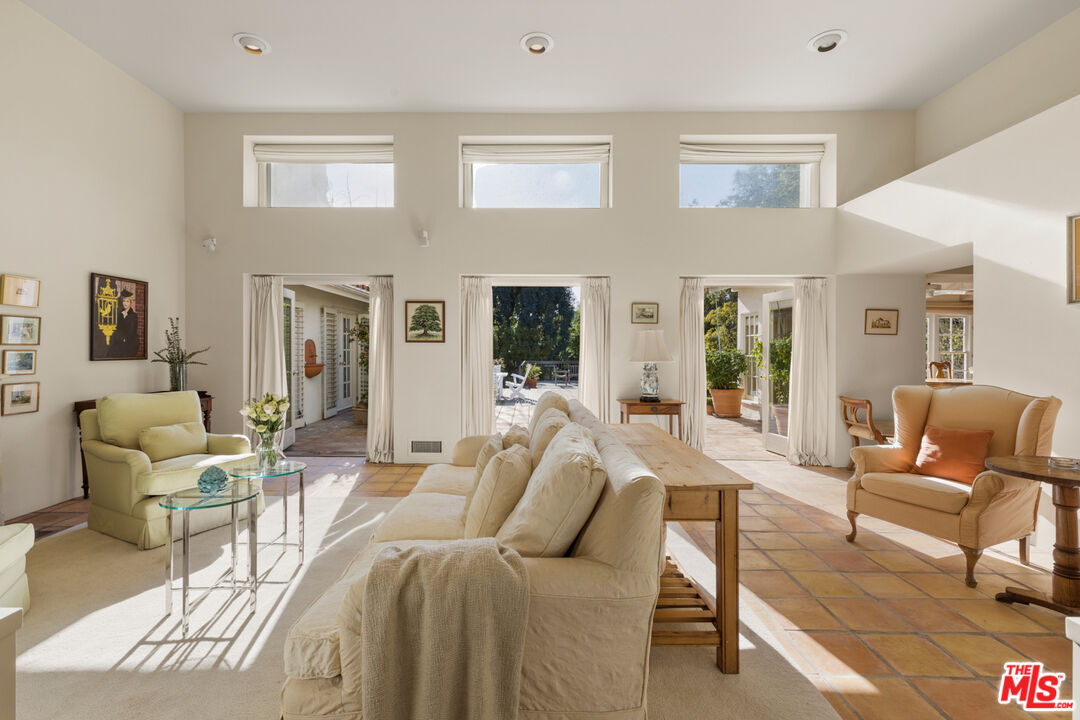 635 North Bonhill Road Los Angeles, CA 90049 - Photo 4 of 19 a living room with furniture and a large window